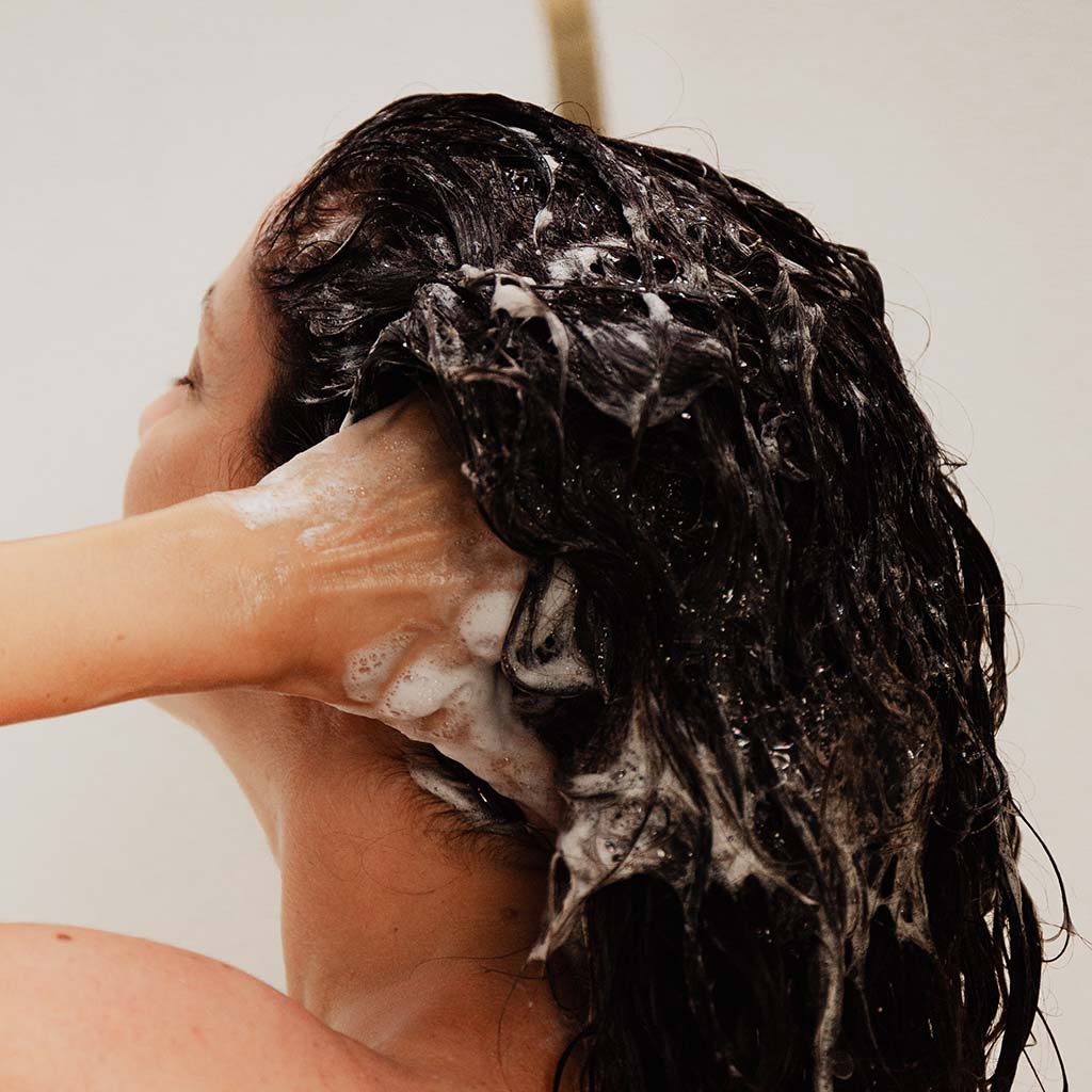 The right way to train your hair to be washed less